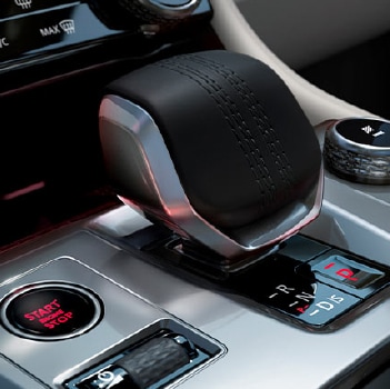 F-PACE interior, focused on gear shift.