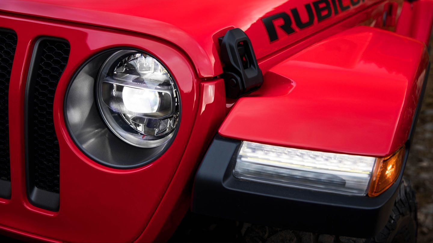 1529951521-oem-jeep-1513969331-oem-jeep-2018-Jeep-Wrangler-JL-Gallery-Exterior-Rubicon-Red-Premium-Headlights.jpg.image.1440.jpg