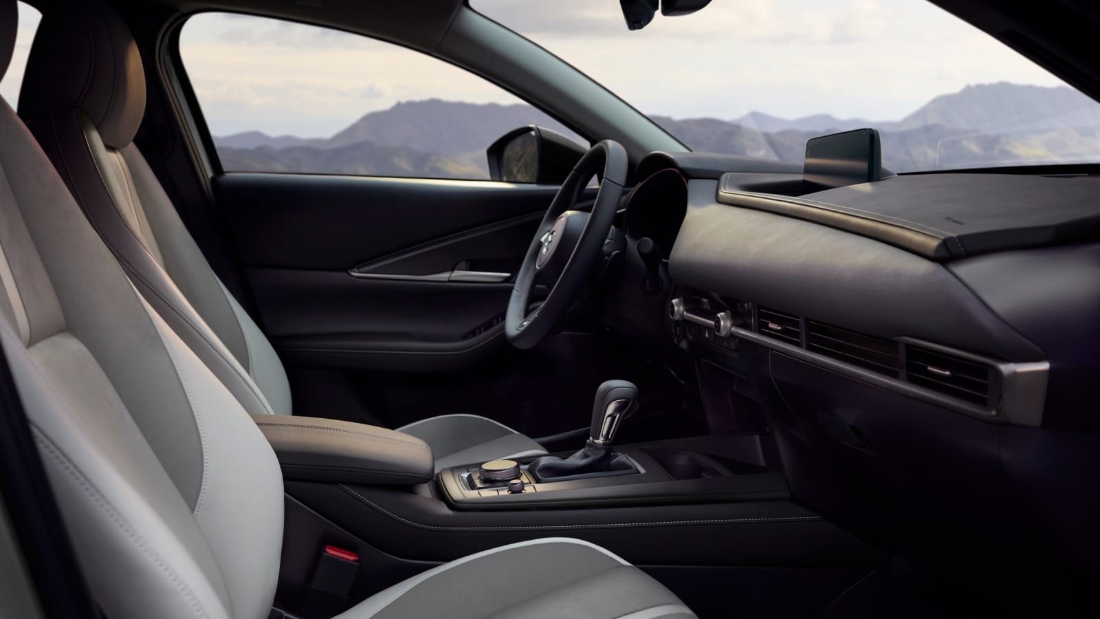 Red Mazda CX-30, premium interior, and HUD at Jake Sweeney Mazda Tri-County.