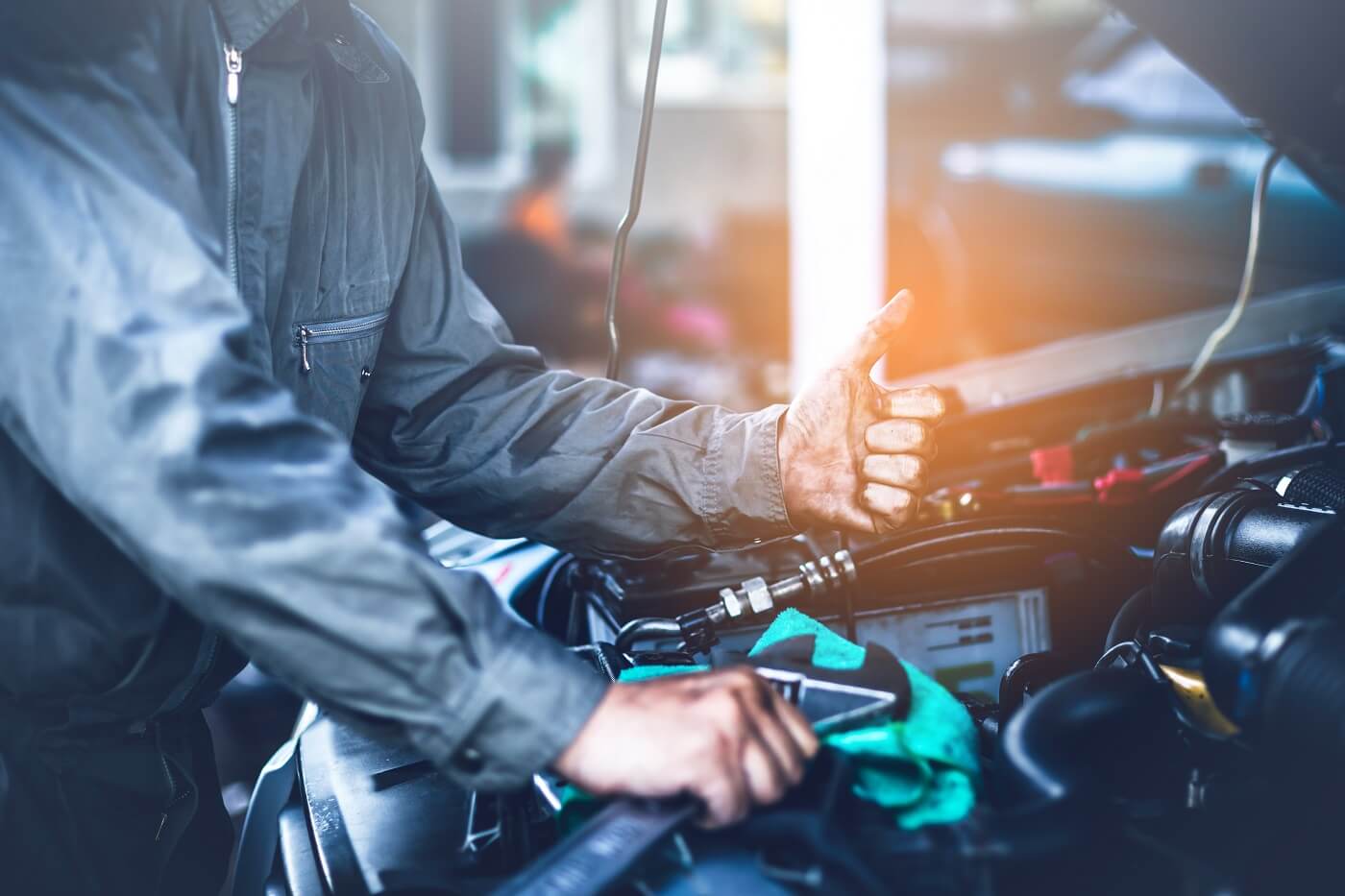 Technician Thumbs Up Wrench Front End Engine 1400.jpg