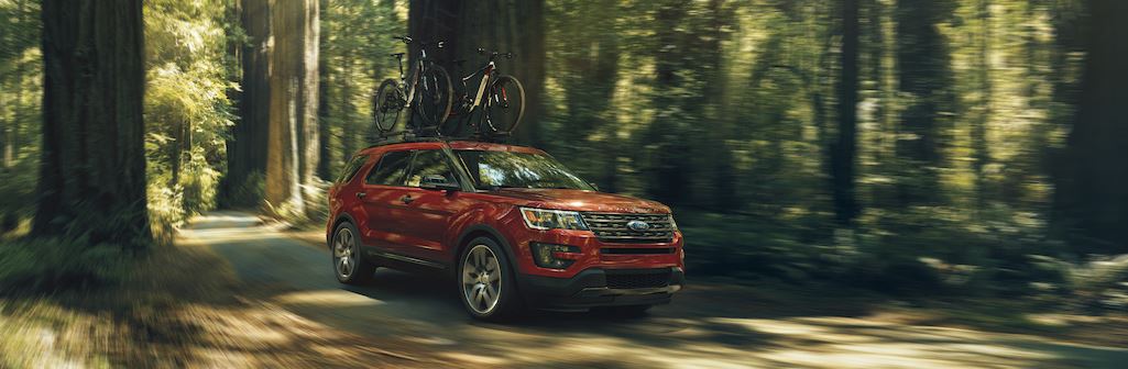explorer_banner.jpg Ford Explorer driving through a forest