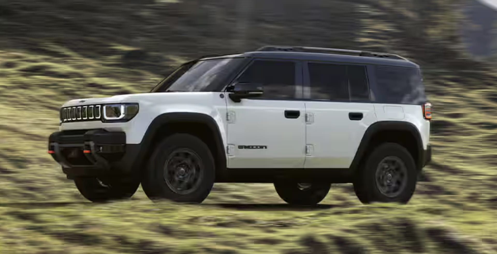2026 Jeep Recon Moab exterior rear three-quarter view showing the swing gate and 33-inch all-terrain tires