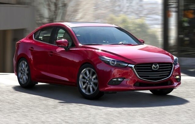 New Mazda3 Red Outside in Ocala, FL