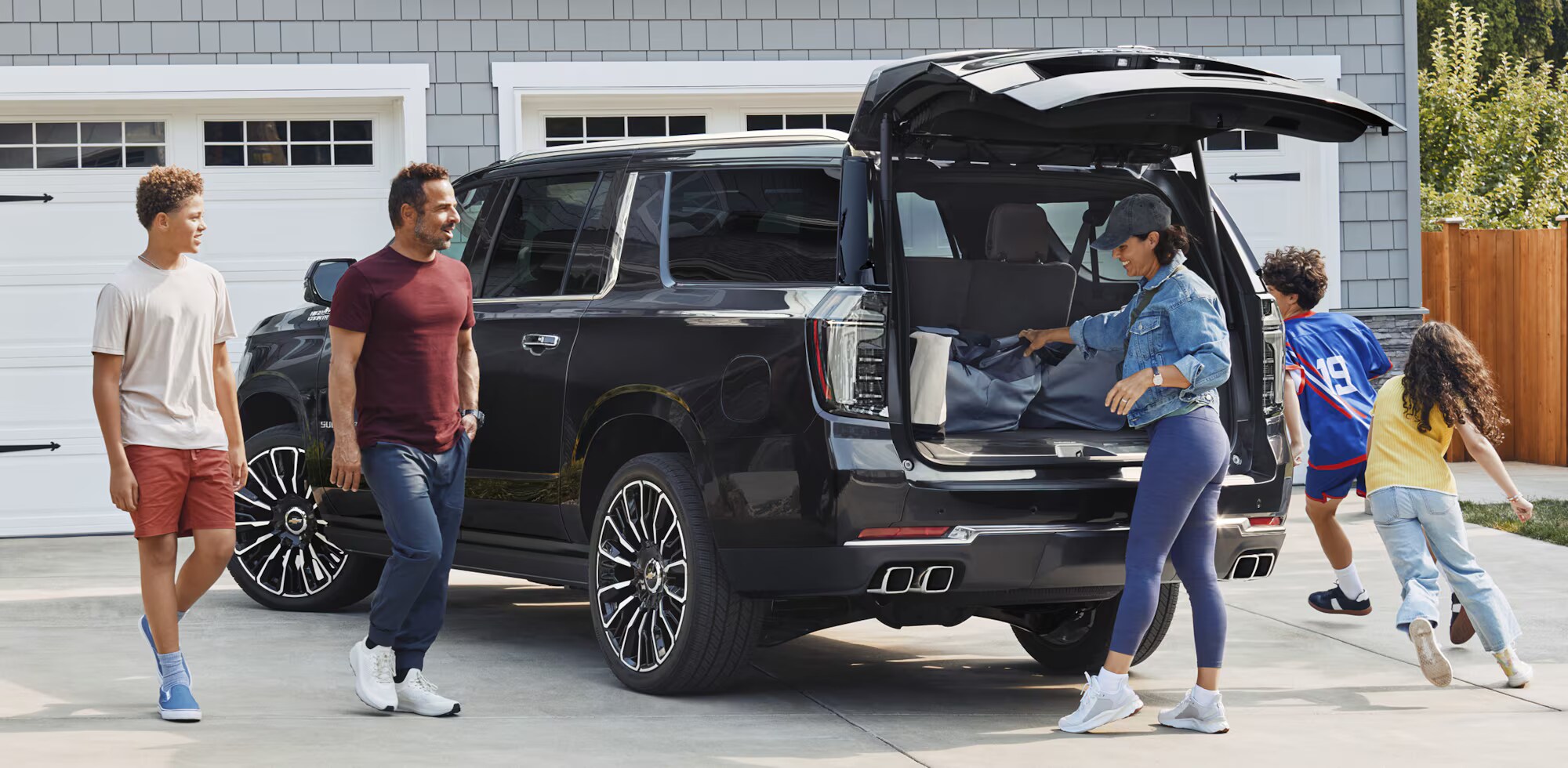 Family enjoying their used chevrolet vehicle