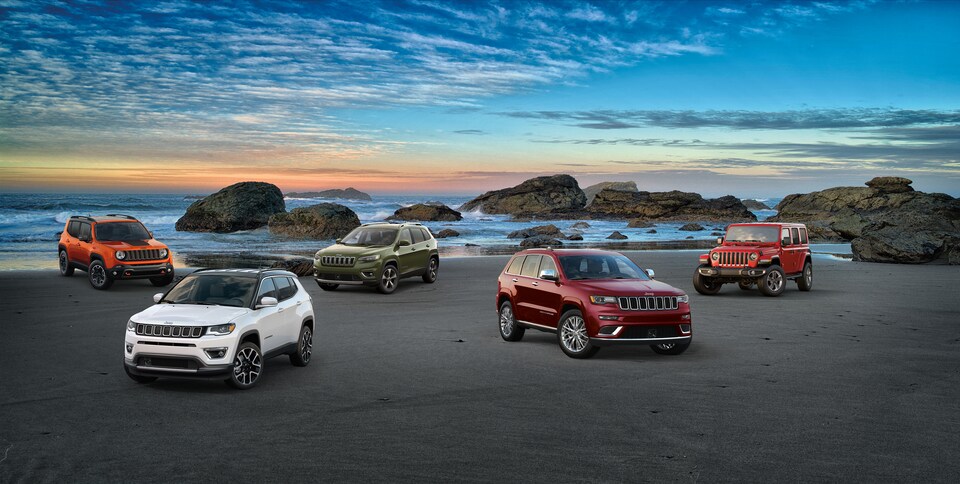 2019-Jeep-Lineup-L03.png Jeep lineup parked on a tropical beach