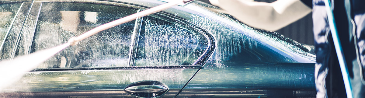 Men Washing His Car