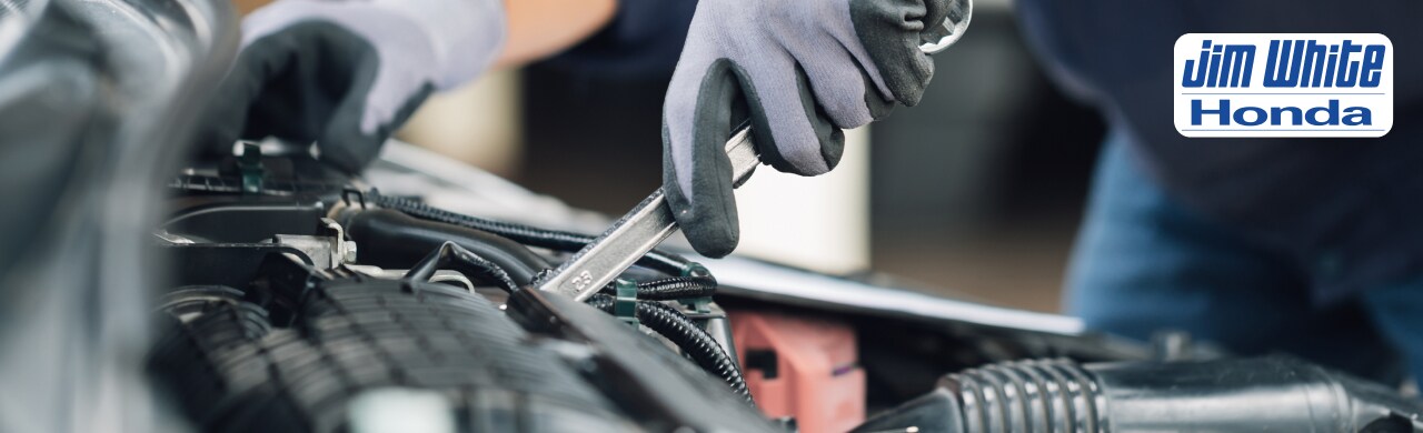 Expert%20Honda%20Mechanics%20in%20Maumee%20%26%20Toledo%2C%20OH%20%20Jim%20White%20Honda.jpg Certified Honda technician performing vehicle inspection and repair at Jim White Honda service center in Maumee, OH