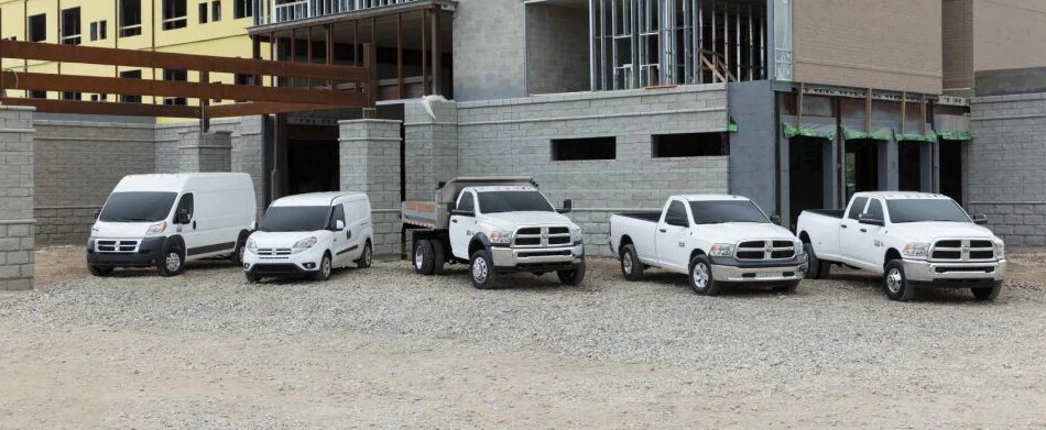 New Ram Model Lineup Thee Ram Model Lineup parked at a construction site