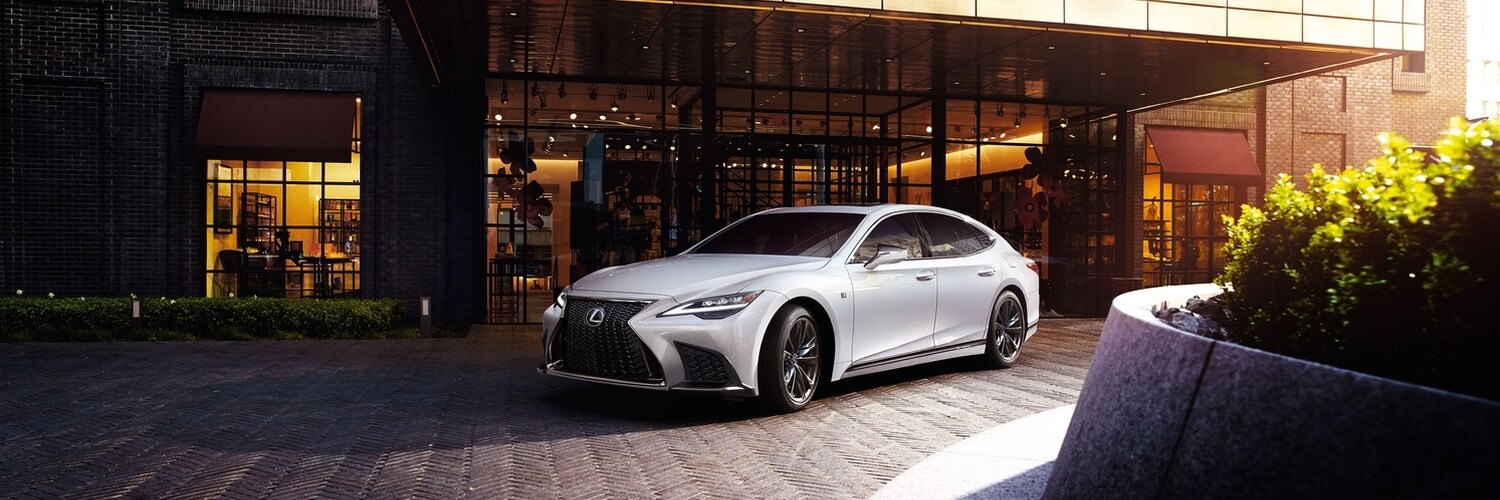 Lexus LS 500 White Lexus LS parked near a modern building