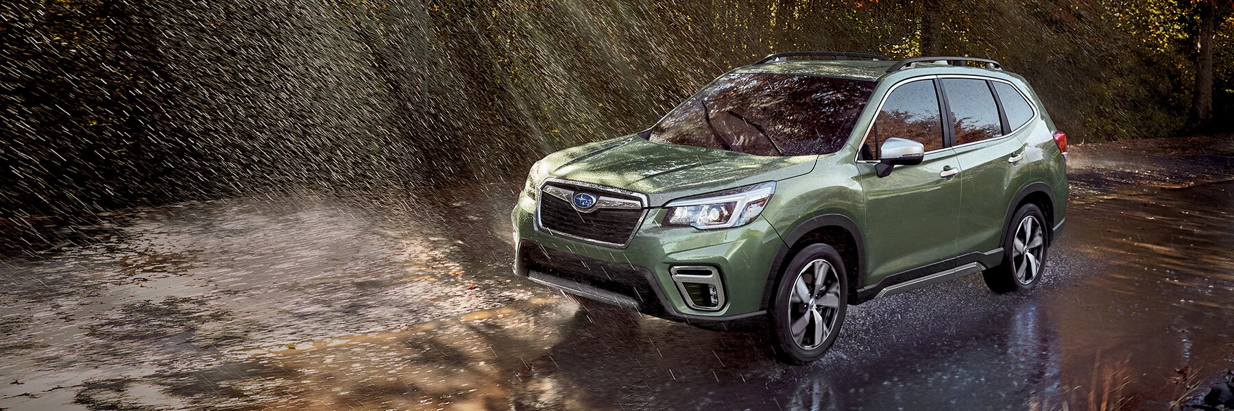Subaru Forester driving through rain