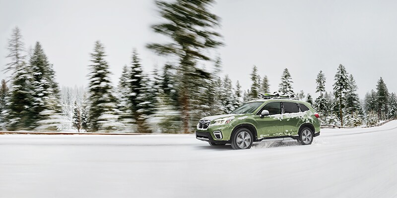 Subaru Forester driving through snow