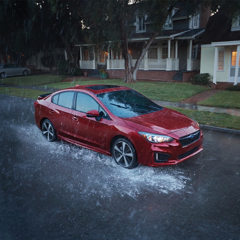 Subaru Impreza in the rain