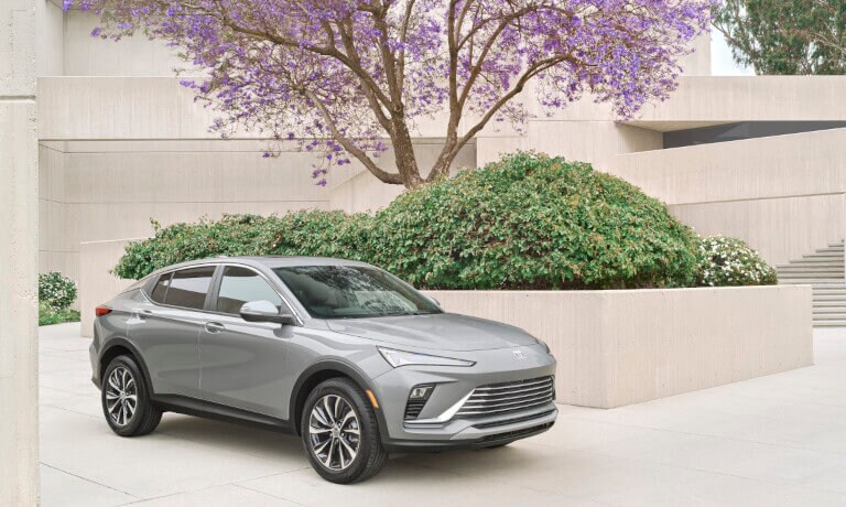 2025 Buick Envista parked in front of cherry tree