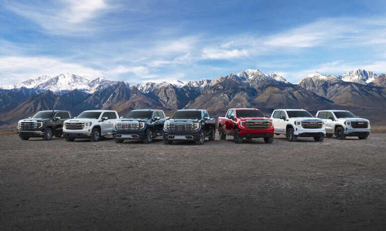 2025 GMC Sierra 1500 lineup parked in mountains