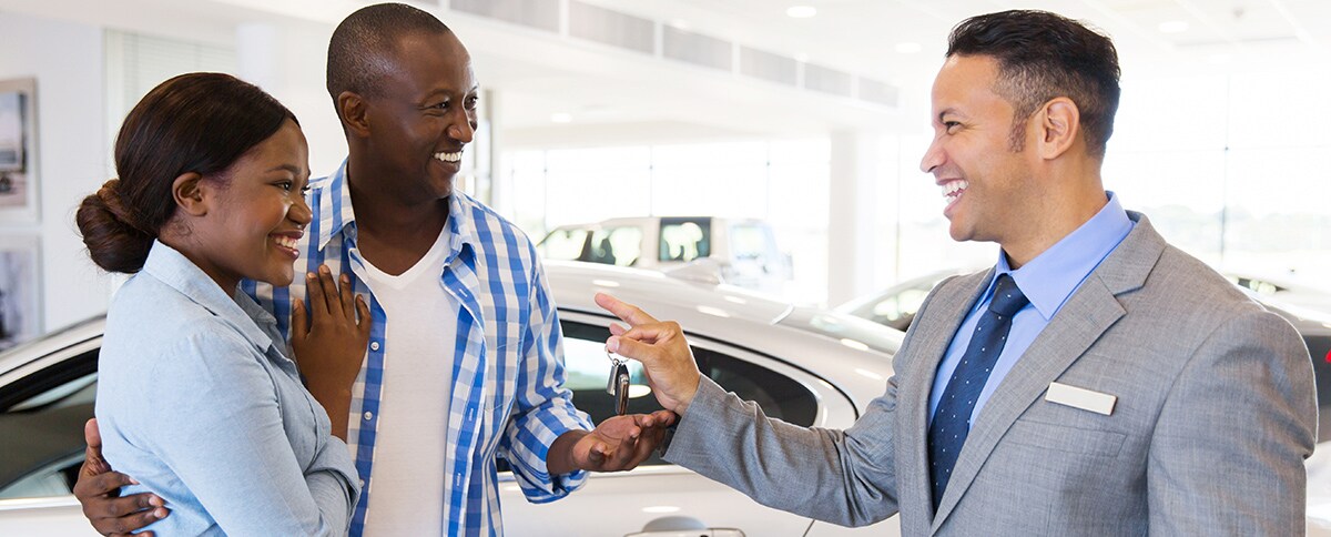 Associate give a customer car keys