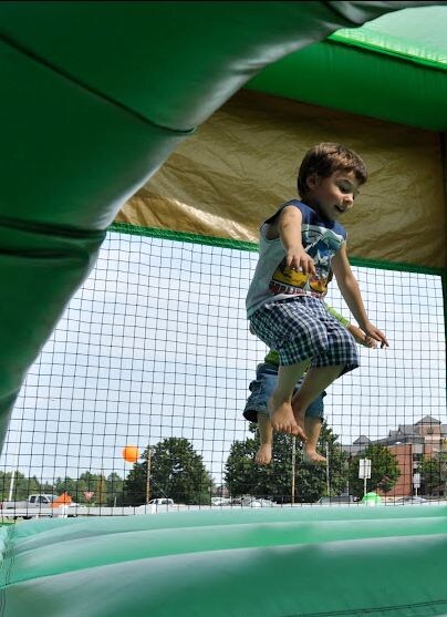 Little boy on bouncy house.JPG
