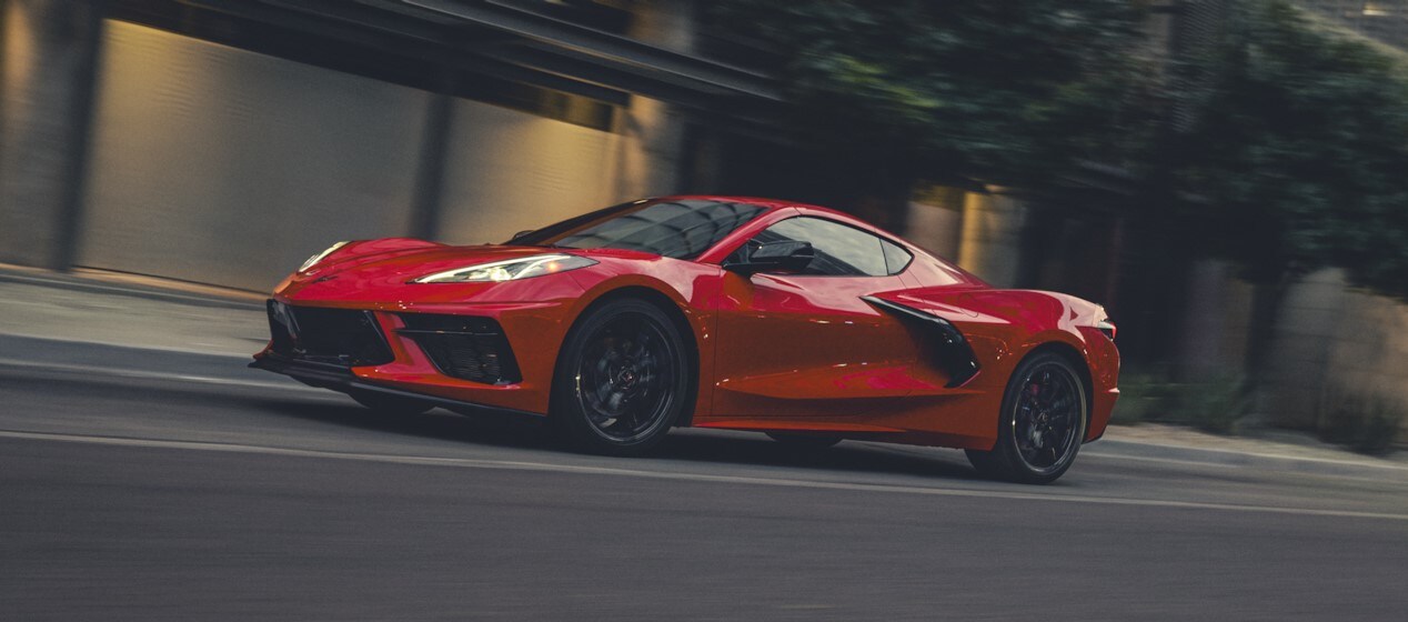 2025 Chevy Corvette Stingray driving down the block 2025 Chevy Corvette Stingray driving down the block