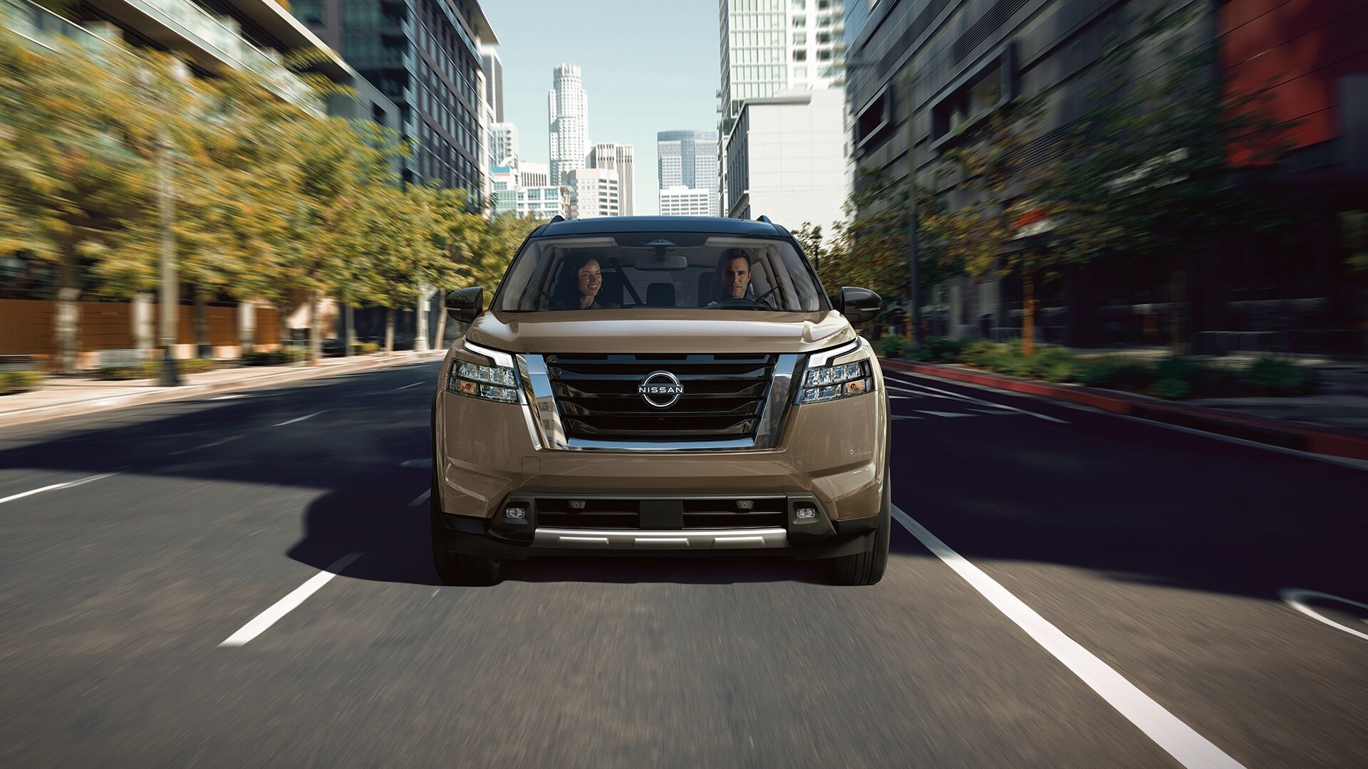 tan Nissan Rogue SUV