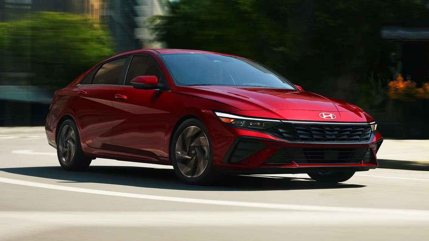 red Hyundai Elantra driving