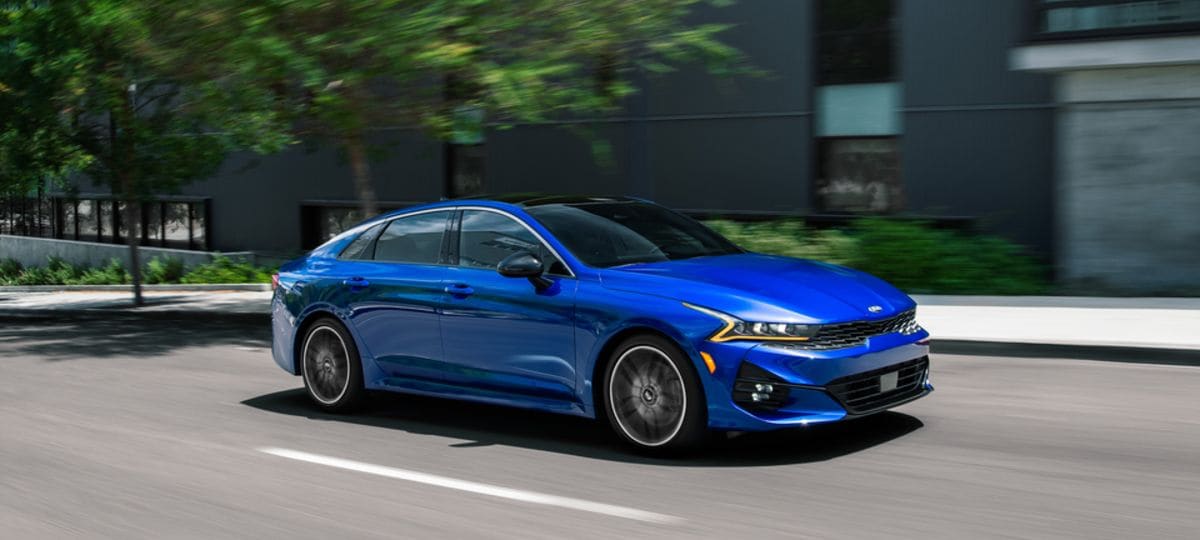 2021-Kia-K5-GT-FWD-Sedan blue in motion_res.jpeg