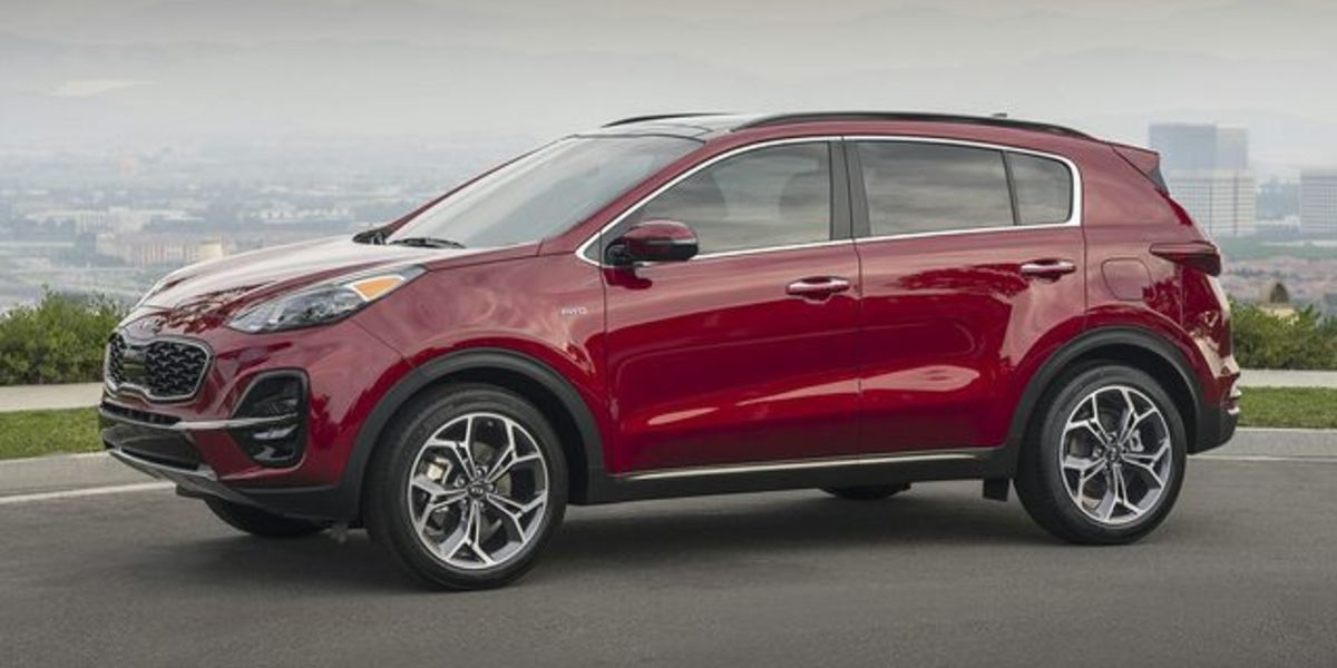 2021 Kia Sportage LX red by foggy city skyline_res.jpg
