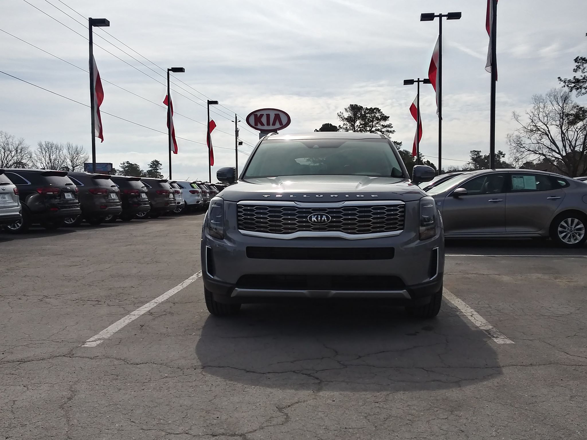 Leasing versus buying a vehicle at Kia of New Bern | Grey 2020 Kia Telluride parked in dealer lot