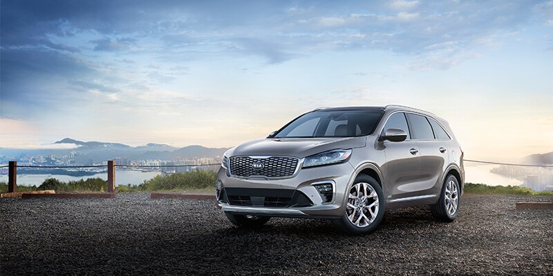 Kia Sorento near mountains and lake