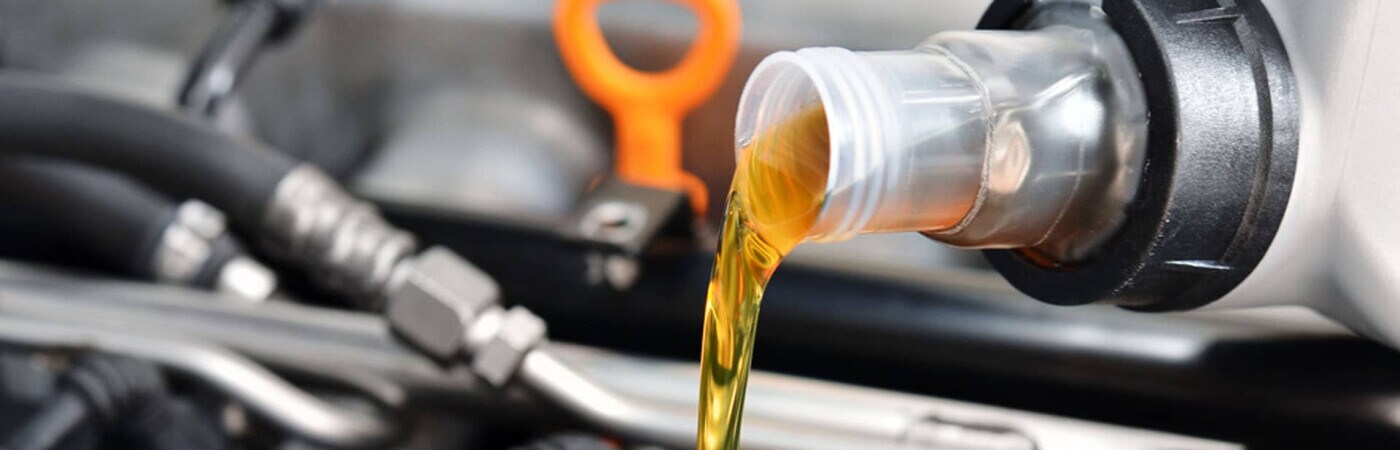 oil pouring into engine