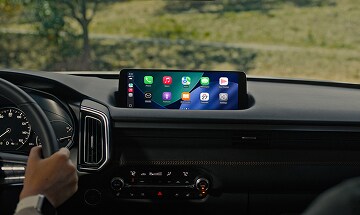 Apple CarPlay@ integration for your iPhone (shown) allows you to access maps, playlists, contacts, and compatible apps. Android Auto™ is also available.*