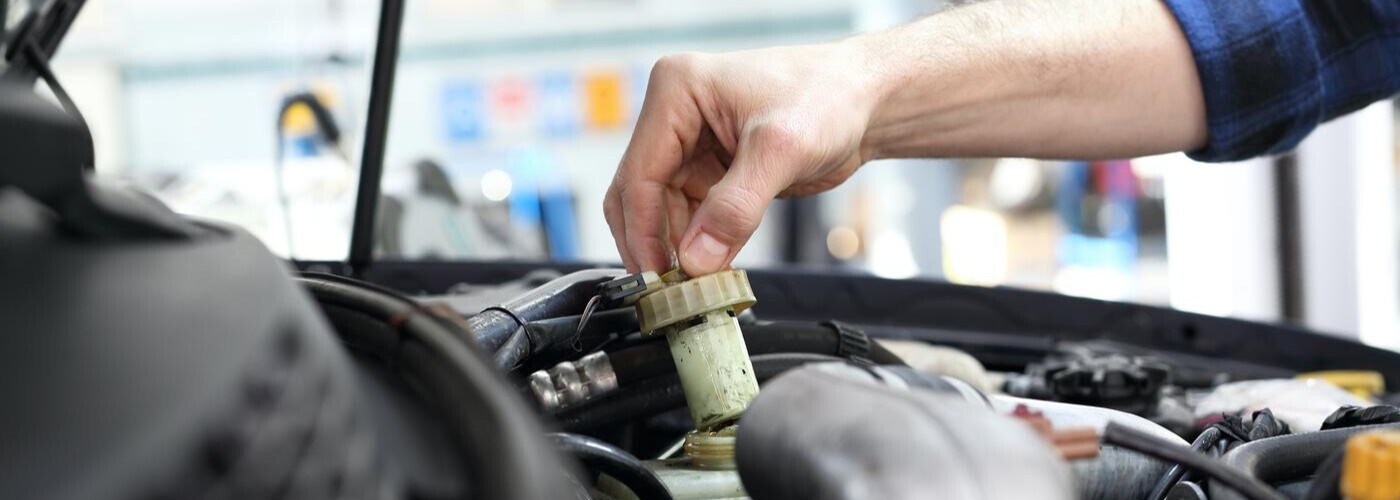 car checking oil.jpeg