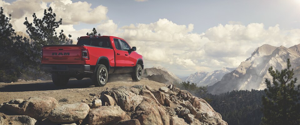 2019 Ram 1500 A red 2019 Ram 1500 parked up on a mountain overlook