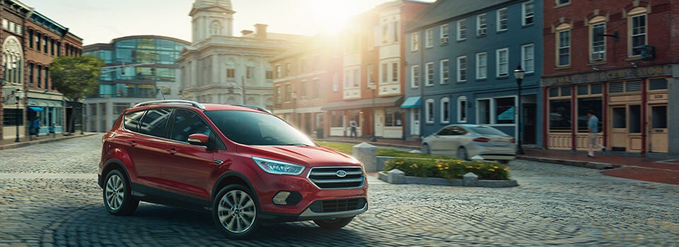 2019 Red Ford Escape 2019 Ford Escape driving in town