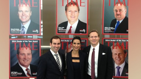 Kelly Automotive President Brian Kelly stands alongside his wife Sherry Kelly and Kelly Auto Director of Operations Brian Heney at the TIME Dealer of the Year ceremony in 2014