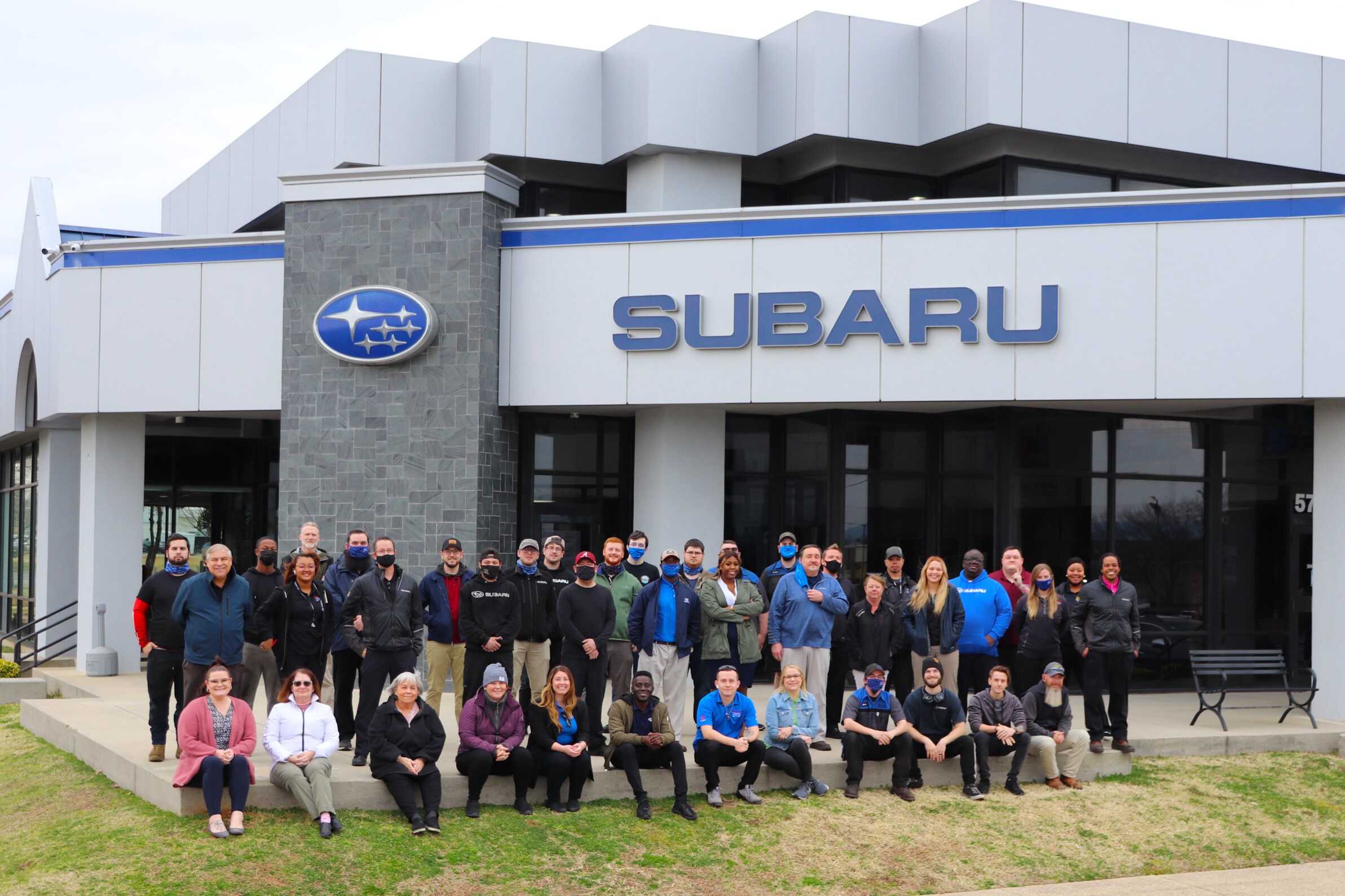 Your Landers McLarty Subaru team in front of store Your Landers McLarty Subaru team in front of store