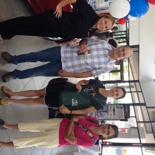 Jodie and her customers.jpg