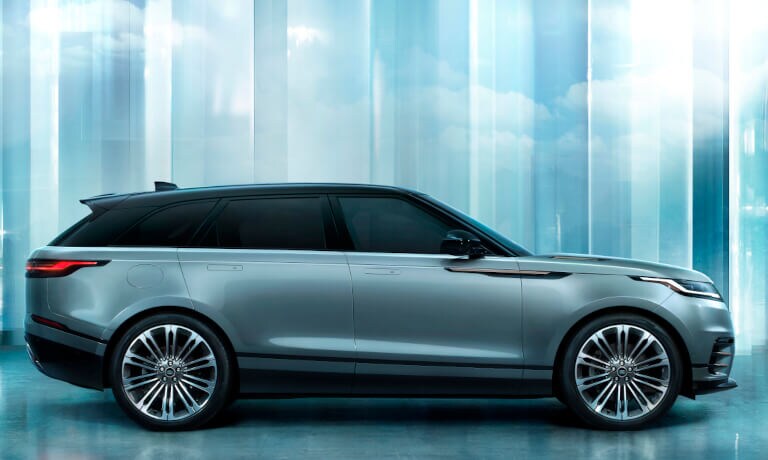 2026 Range Rover Velar side profile in blue room
