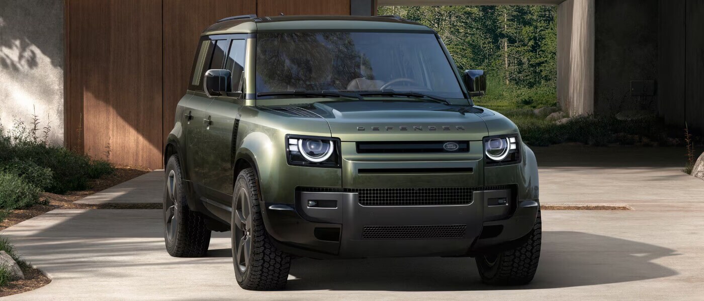 2026 Land Rover Defender parked by a building