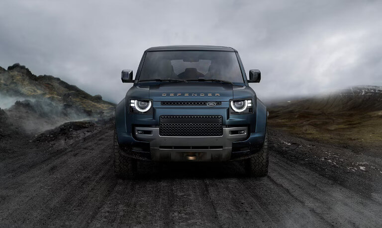 2026 Land Rover Defender offroading head-on