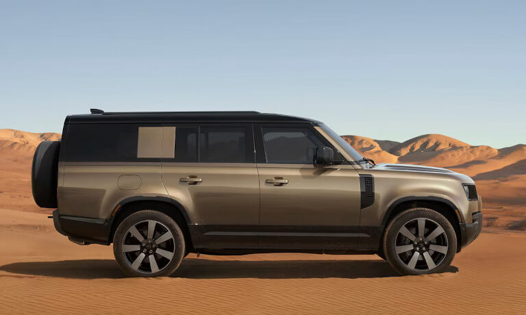 2026 Land Rover Defender side view in desert