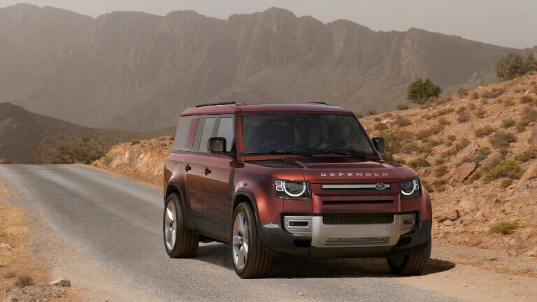 2023 Land Rover Defender Exterior Driving On Desert Road
