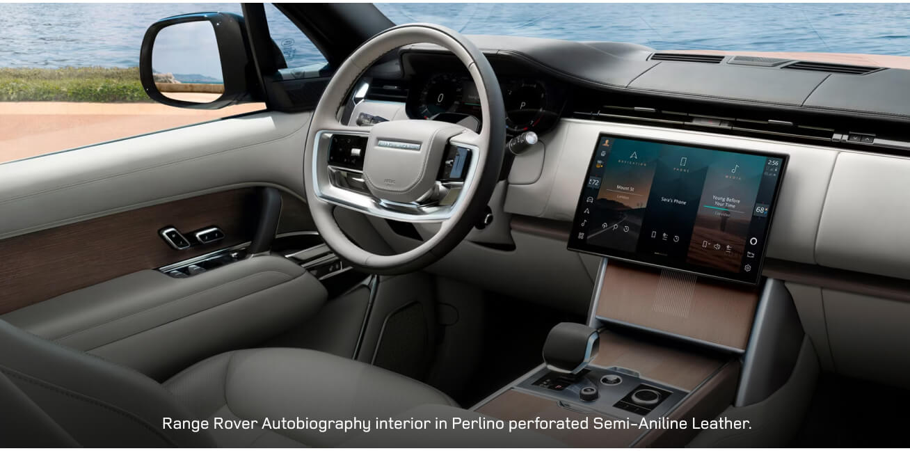 Interior cockpit view of a Range Rover Autobiography showcasing the digital interface and Perlino cabin.