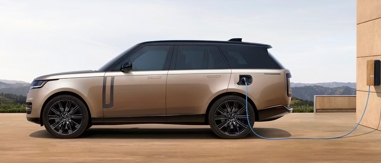 Range Rover plugged into a Charging Station Range Rover plugged into a Charging Station