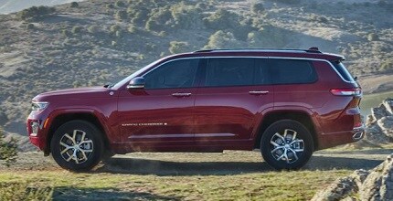 Jeep Grand Cherokee L red Jeep Grand Cherokee L side view