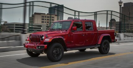 Jeep Gladiator Jeep Gladiator driving on city road