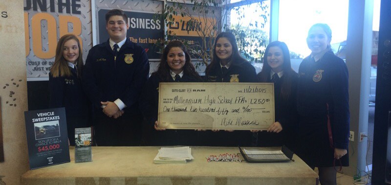 Members of Next Crop receiving their Check from Avondale Dodge Ram Members of Next Crop receiving their Check from Avondale Dodge Ram