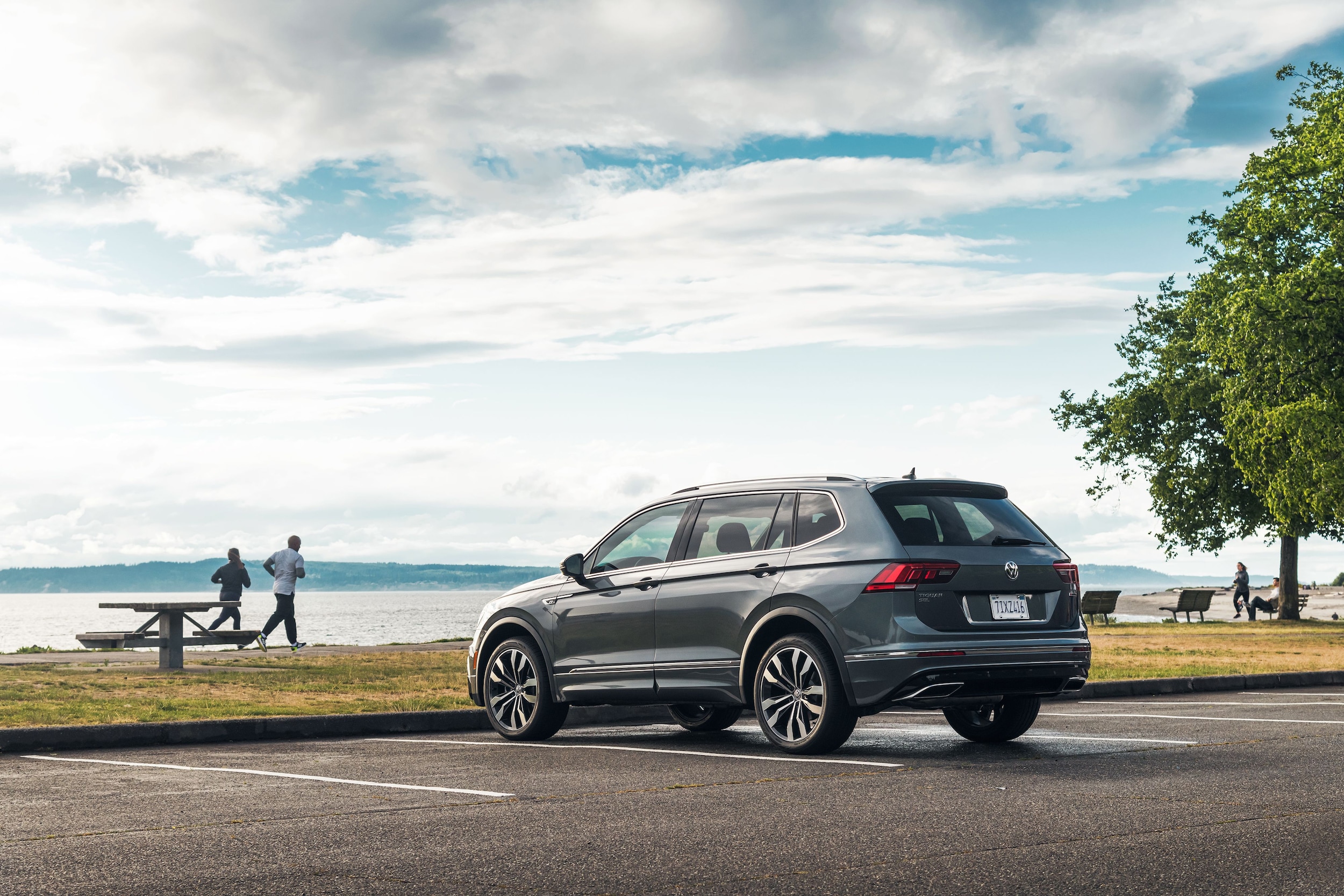 VW Tiguan Topaz VW Tiguan driving past shops