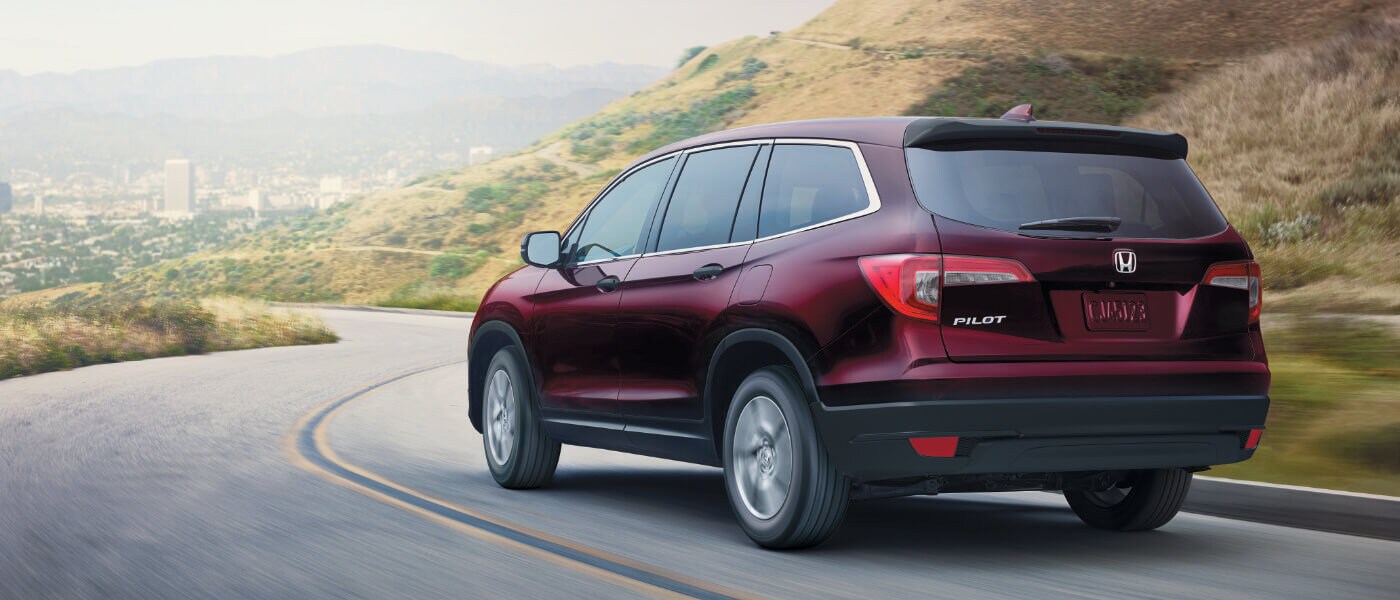 New Red 2020 Honda Pilot on road