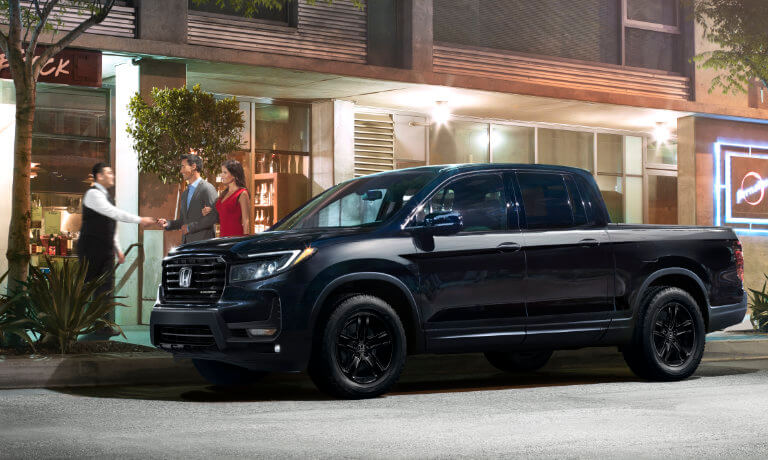 2023 Honda Ridgeline Black Edition exterior parked at a restaurant