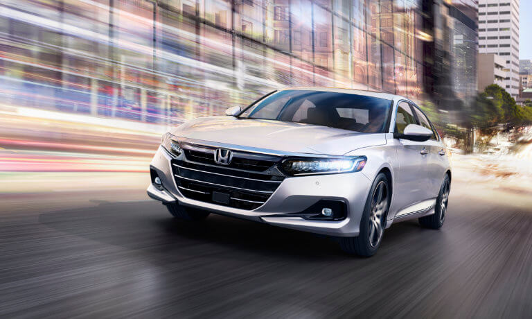 2023 Honda Accord exterior driving up a city ramp