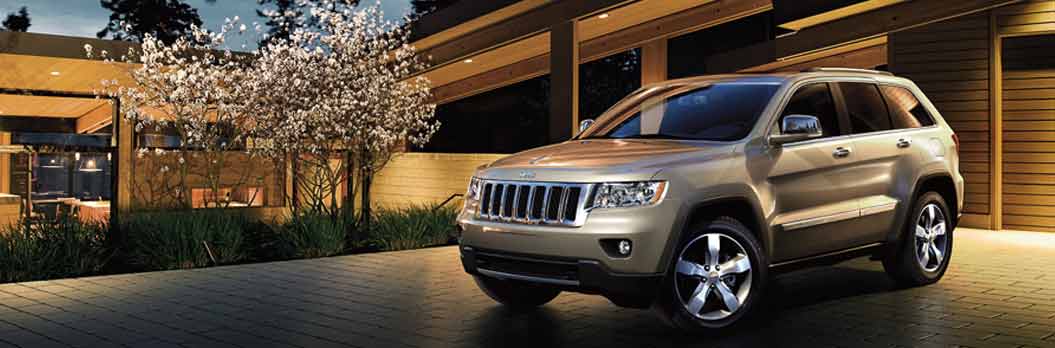 2013 Jeep Grand Cherokee Laredo E Exterior Silver Side View.jpg